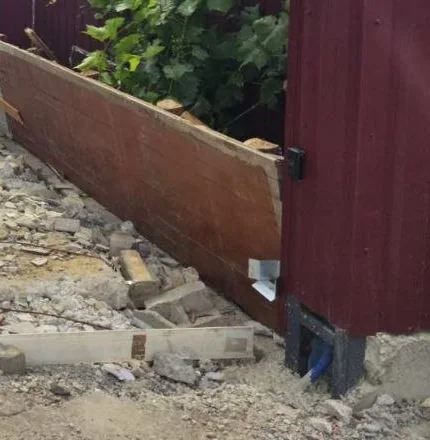 Tightly cropped archive frame of courtyard ground preparation